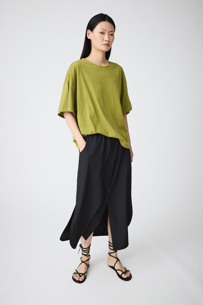 Camiseta de corte holgado confeccionada en jersey de algodón de mujer. Tantä. Color Verde