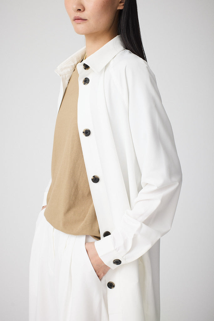 Sobrecamisa de Mujer larga confeccionada en tejido 4-ways stretch secado rápido. Tantä. Color Blanco