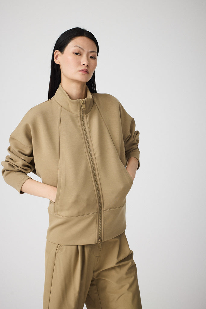 Sudadera de Mujer Tantä con cremallera en tejido interlock secado rápido. Color Marrón 