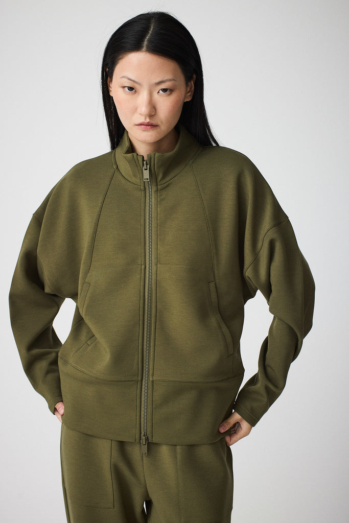 Sudadera de Mujer Tantä con cremallera en tejido interlock. Color Verde 
