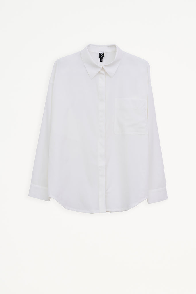 Camisa Mujer Tantä Hazo confeccionada en tejido ligero de secado rápido. Color Blanco 