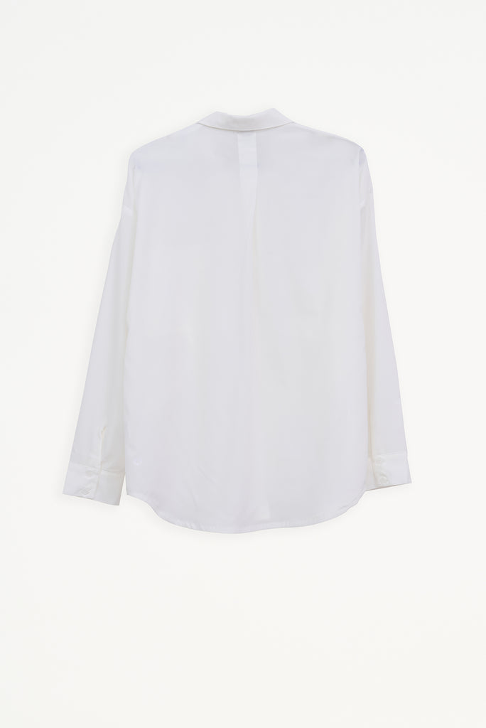 Camisa Mujer Tantä Hazo confeccionada en tejido ligero de secado rápido. Color Blanco 