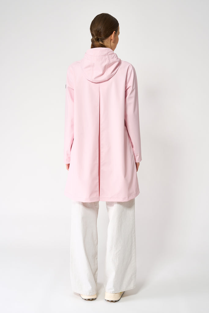 Chubasquero impermeable de mujer Nuovola de Tantä. Color rosa