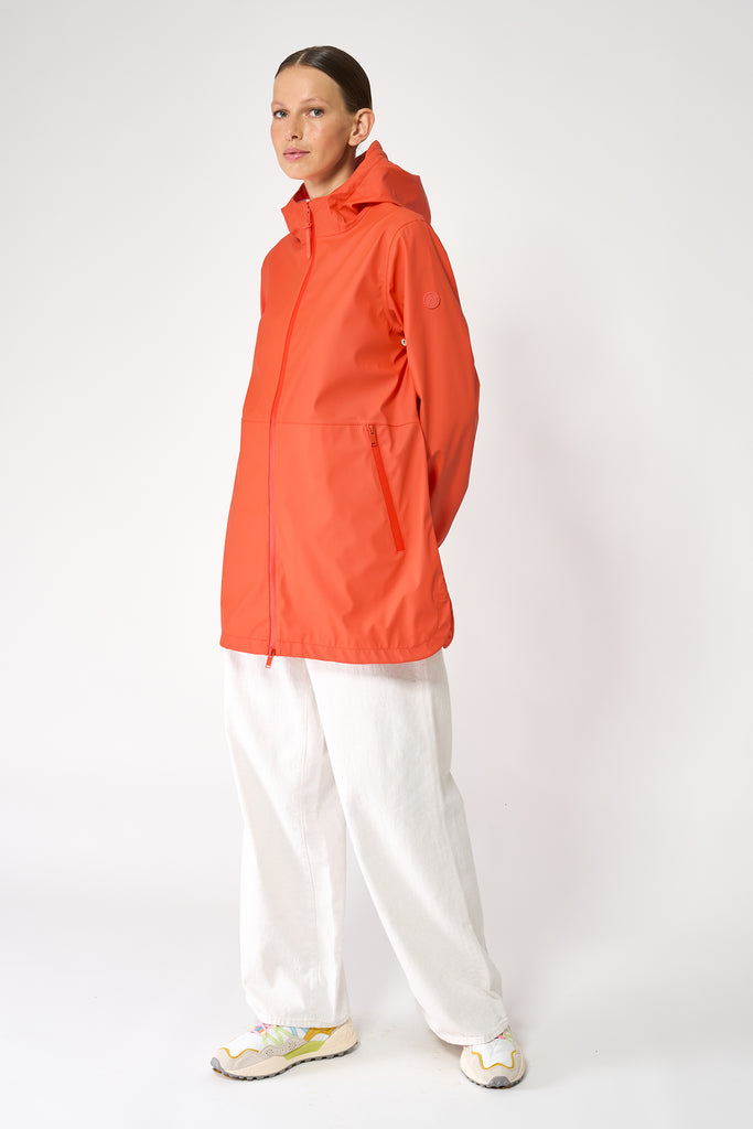 Chaqueta impermeable Brouillard de Mujer Tantä. Color Naranja