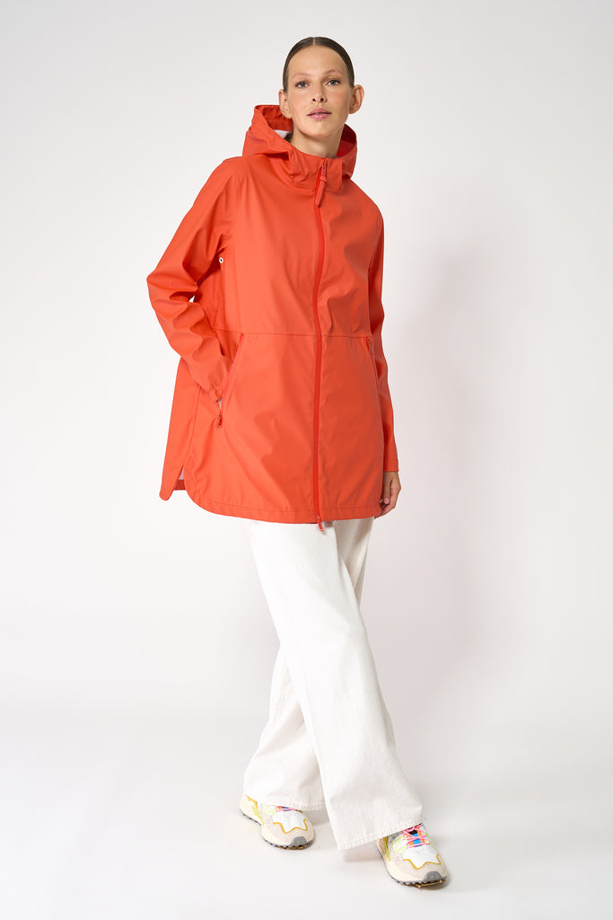 Chaqueta impermeable Brouillard de Mujer Tantä. Color Naranja