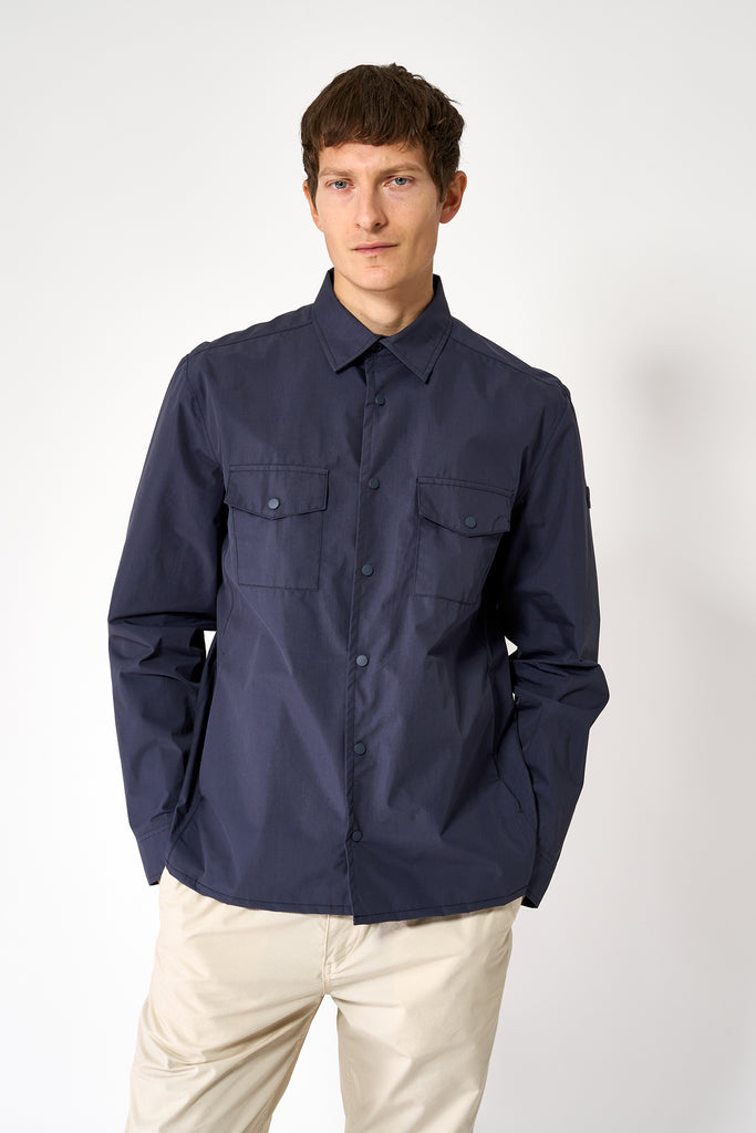 Chaqueta impermeable tipo sobrecamisa de hombre Tantä. Azul